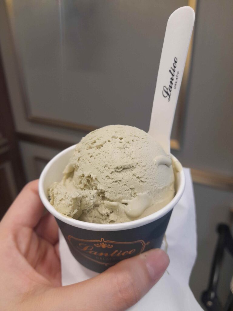 L'antico Gelato pistachio gelato single scoop in a cup